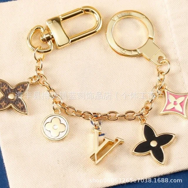 Louis Vuitton Uncategorized Metal car keychain with LV monogram and floral charms product detail image 5