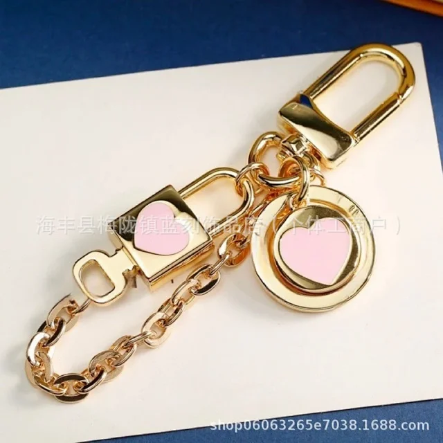 Louis Vuitton Uncategorized Metal car keychain with LV monogram and floral charms product detail image 1