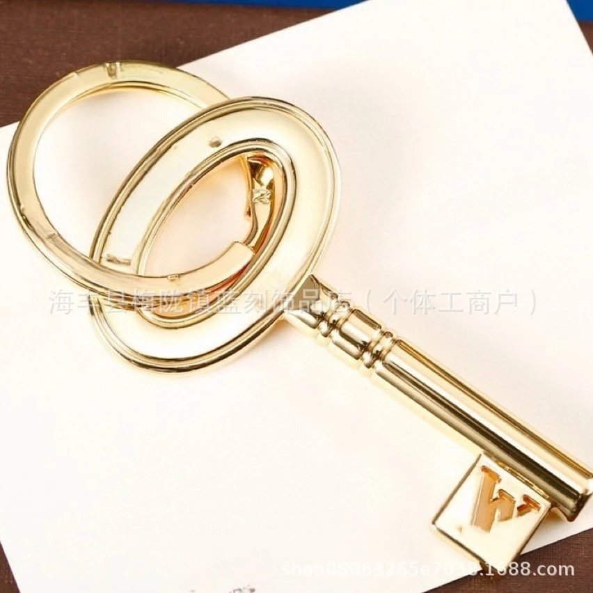 Gold-Tone Heart Charm Keychain with Pink Enamel Accents Accessories - 3