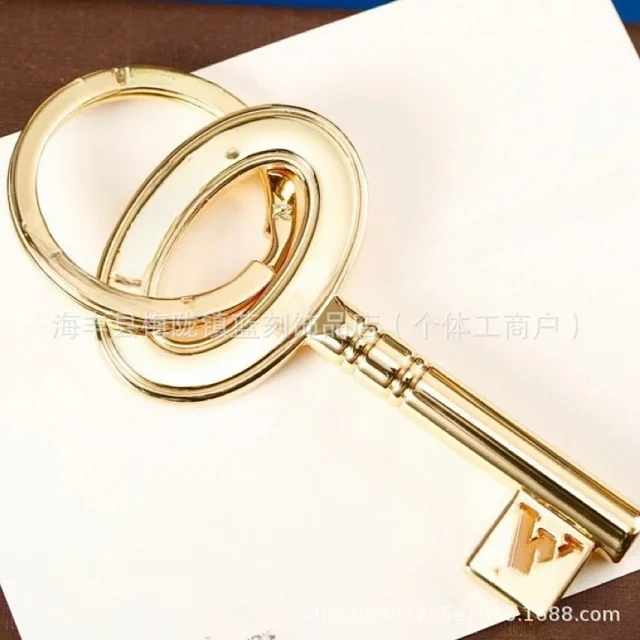 Louis Vuitton Uncategorized Metal car keychain with LV monogram and floral charms product detail image 3