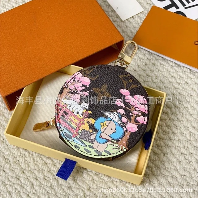 Louis Vuitton Wallets & Card Holders Round Zip Coin Purse Keychain with Cartoon Print product detail image 2