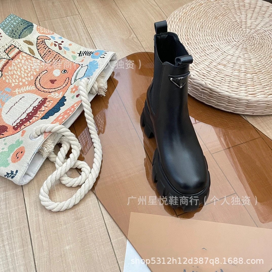 Prada Cleated Chelsea Boots Black - 18