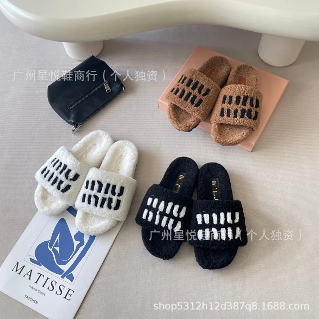 Miu Slippers Shearling Logo Slides product detail image 1
