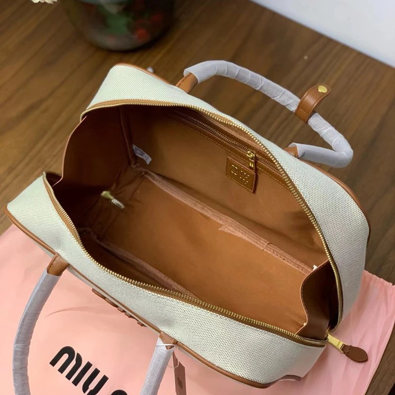 Miu Handbags Bowling handbag with top handles and zip closure image 4