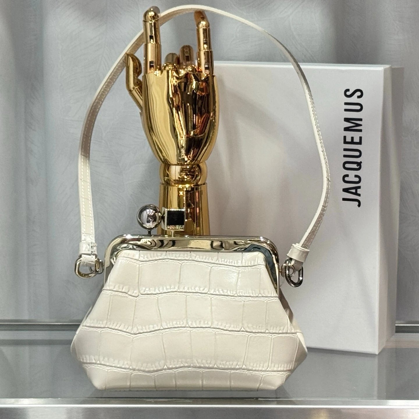 Jacquemus Crossbody Bags Mini frame bag with sculptural hand clasp image 1