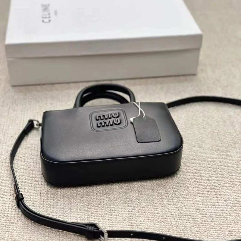 Miu Crossbody Bags Mini top-handle logo bag image 3