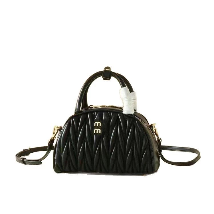Miu Handbags Quilted semicircle top-handle bag with detachable shoulder strap image 5