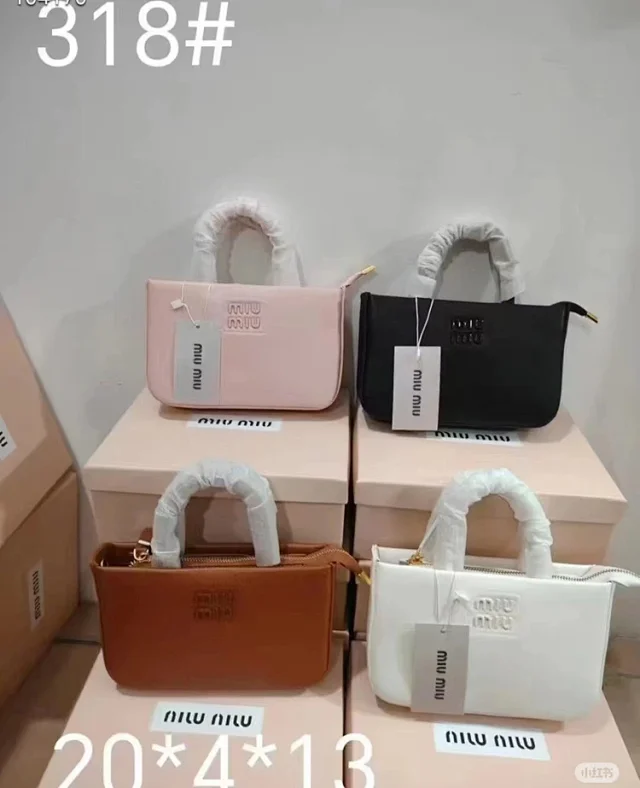 Miu Crossbody Bags Mini top-handle logo bag product detail image 1