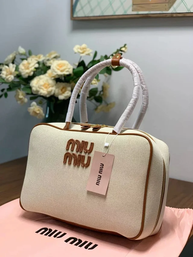 Miu Handbags Bowling handbag with top handles and zip closure product detail image 11