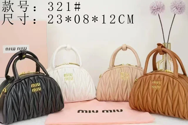 Miu Handbags Quilted semicircle top-handle bag with detachable shoulder strap product detail image 1