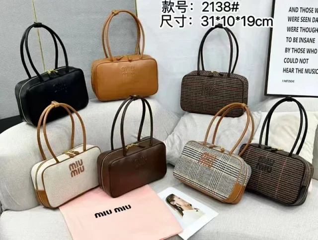 Miu Handbags Bowling handbag with top handles and zip closure product detail image 1