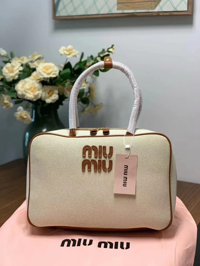 Miu Handbags Bowling handbag with top handles and zip closure product detail image 10