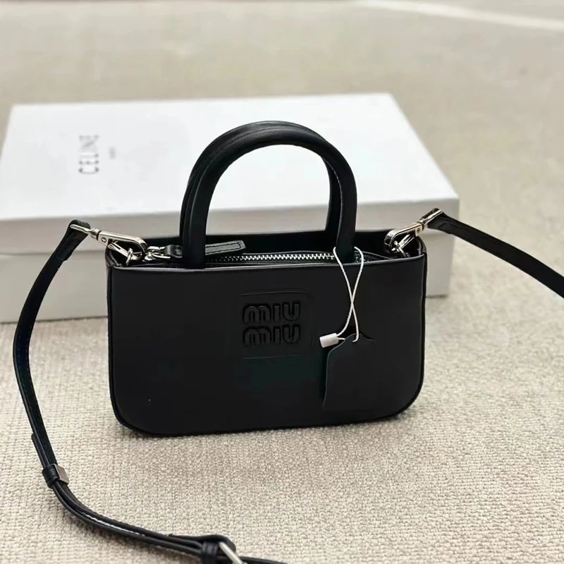 Miu Crossbody Bags Mini top-handle logo bag image 2