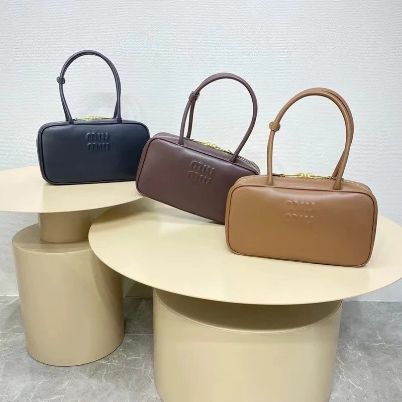 Miu Handbags Bowling handbag with double top handles image 1