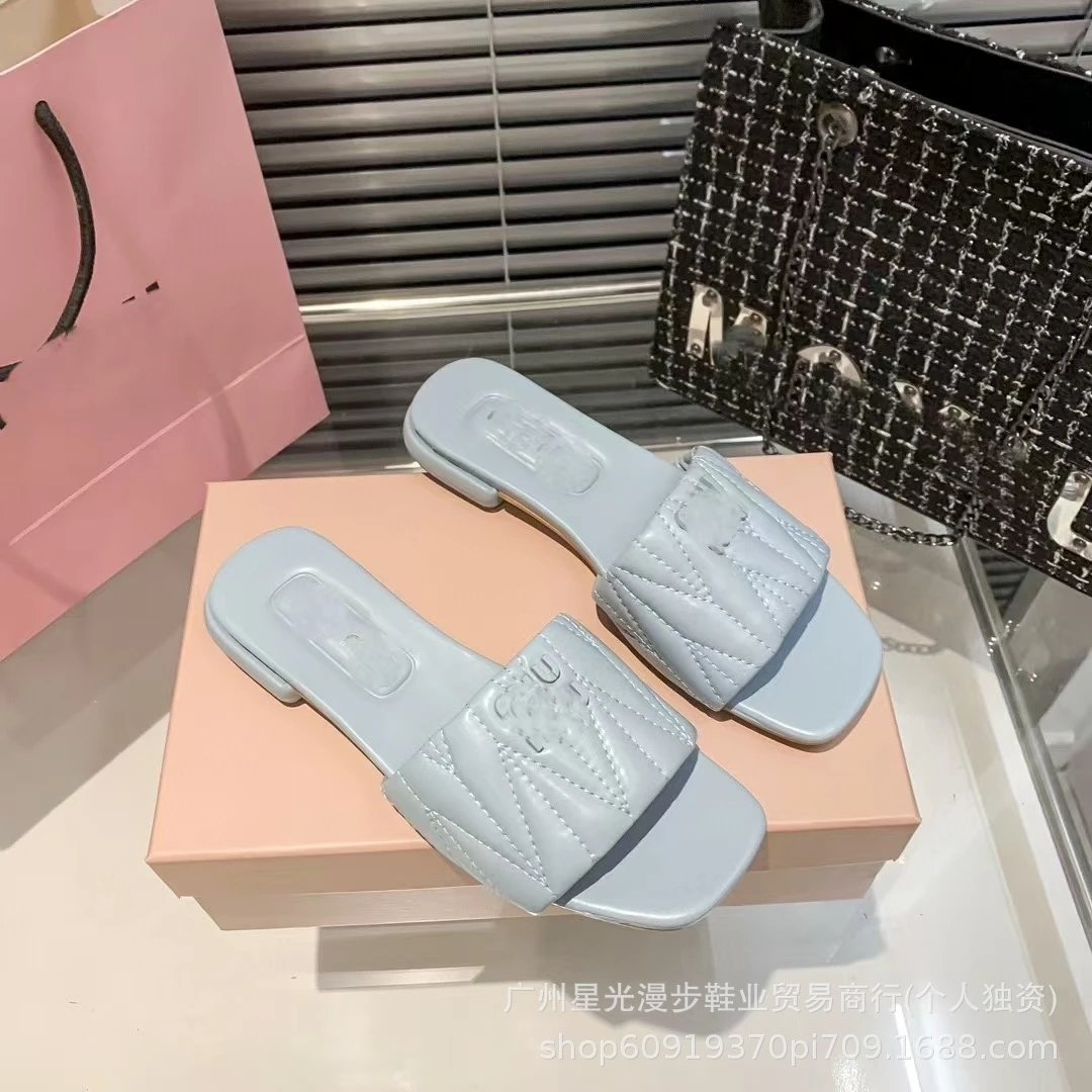 Quilted Slide Sandals in Pale Blue Slippers