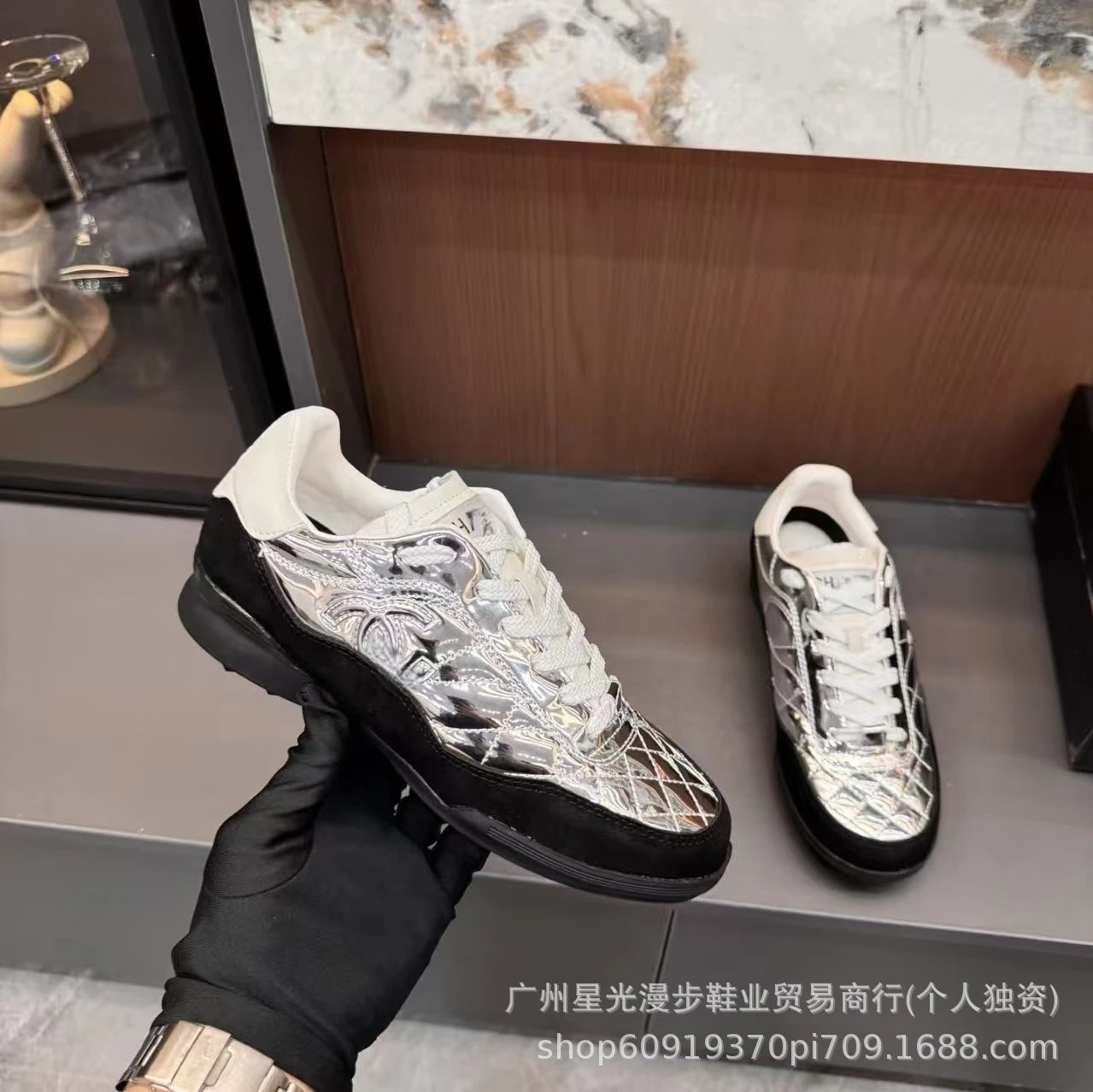 Chanel Sporty Sneakers Silver Quilted Metallic Upper Black Sole Sneakers