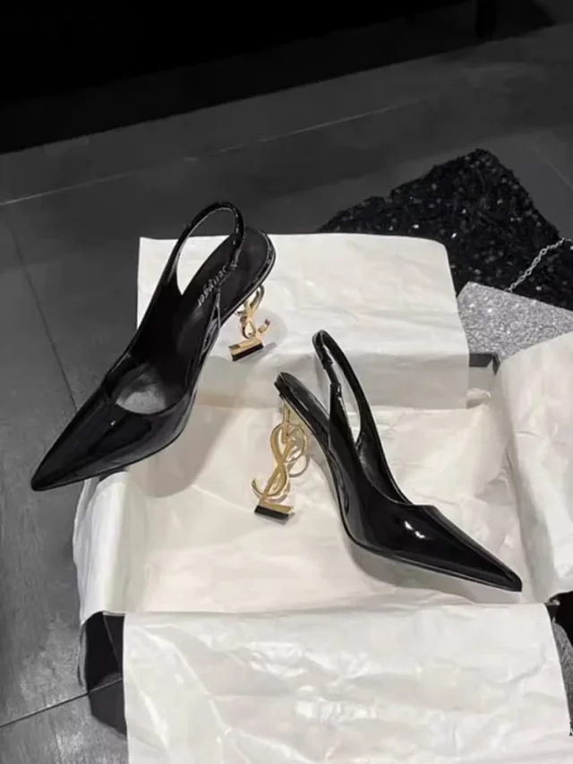 Saint Laurent High Heels Patent pointed-toe slingback with gold monogram product detail image 2