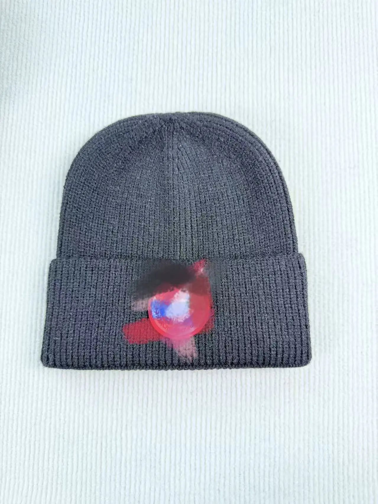 Black Badge Beanie — Positive Red Mark Black colorway — USFans Spreadsheet photo
