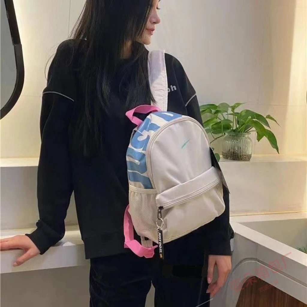 Nike Just Do It Mini Backpack White with Blue and Pink Accents - 20