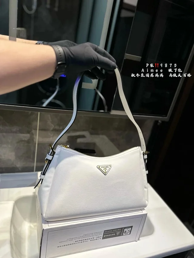 Prada Crossbody Bags Triangle-shaped bag with detachable zip pouch product detail image 10