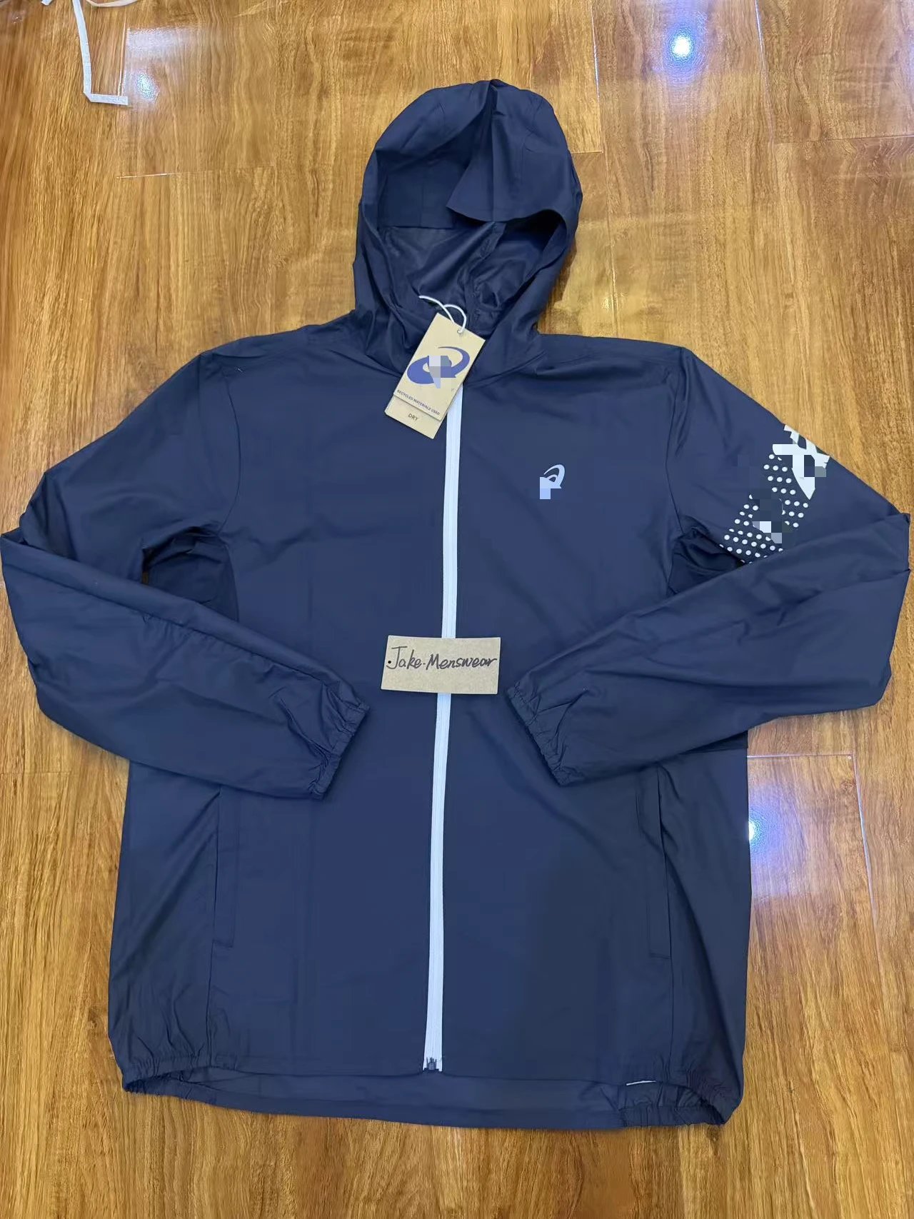 ASICS Jackets Hooded full-zip windbreaker jacket with contrast zipper and dotted sleeve graphic — Navy blue coat