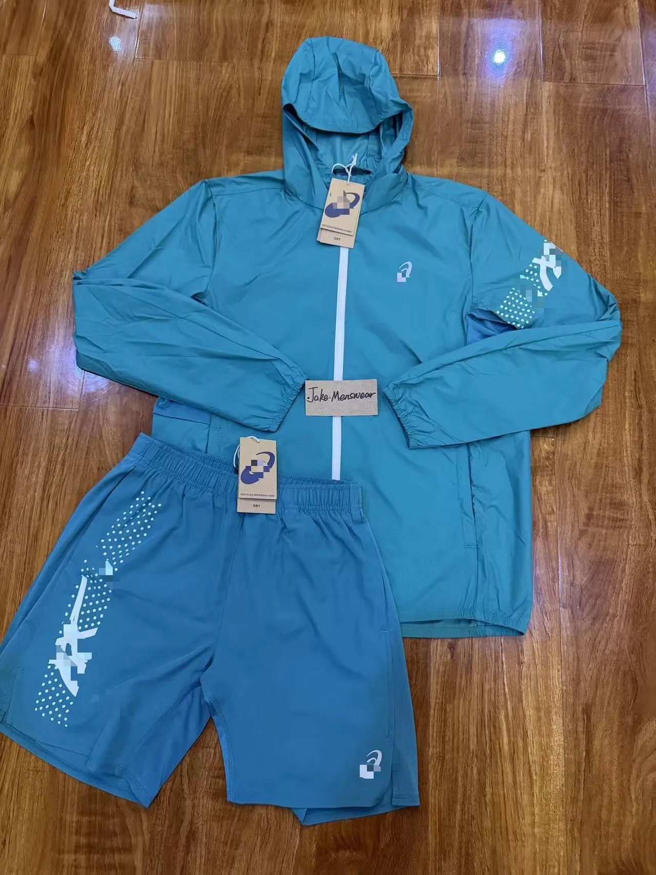 ASICS Jackets Hooded full-zip windbreaker jacket with contrast zipper and dotted sleeve graphic — Green two-piece set
