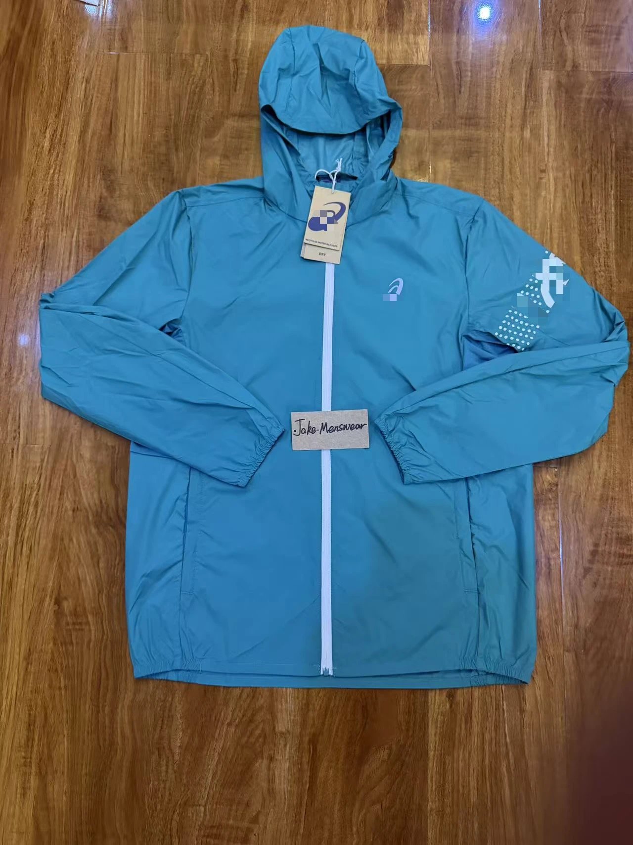 ASICS Jackets Hooded full-zip windbreaker jacket with contrast zipper and dotted sleeve graphic — Green coat