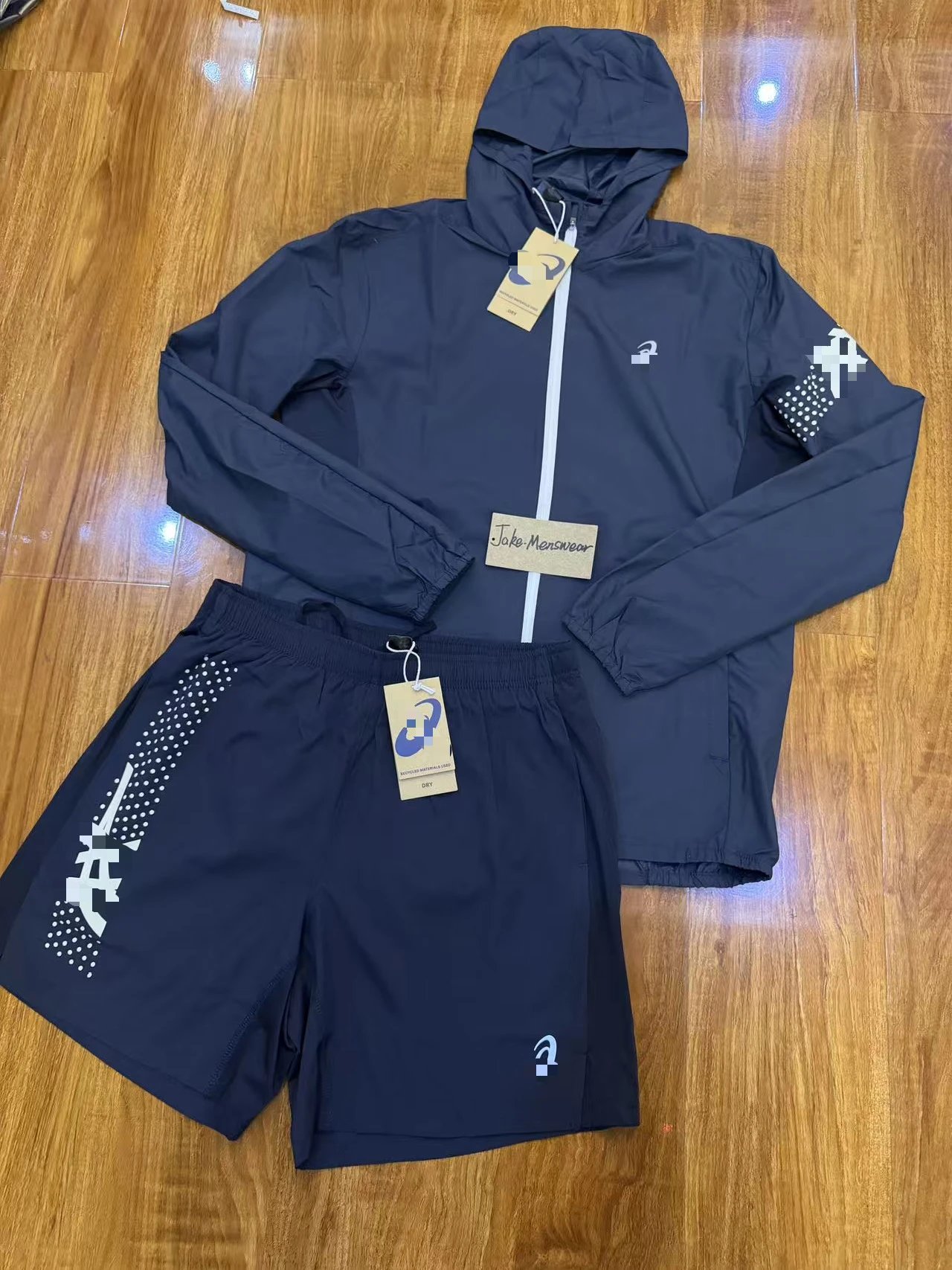ASICS Jackets Hooded full-zip windbreaker jacket with contrast zipper and dotted sleeve graphic — Dark blue two-piece set