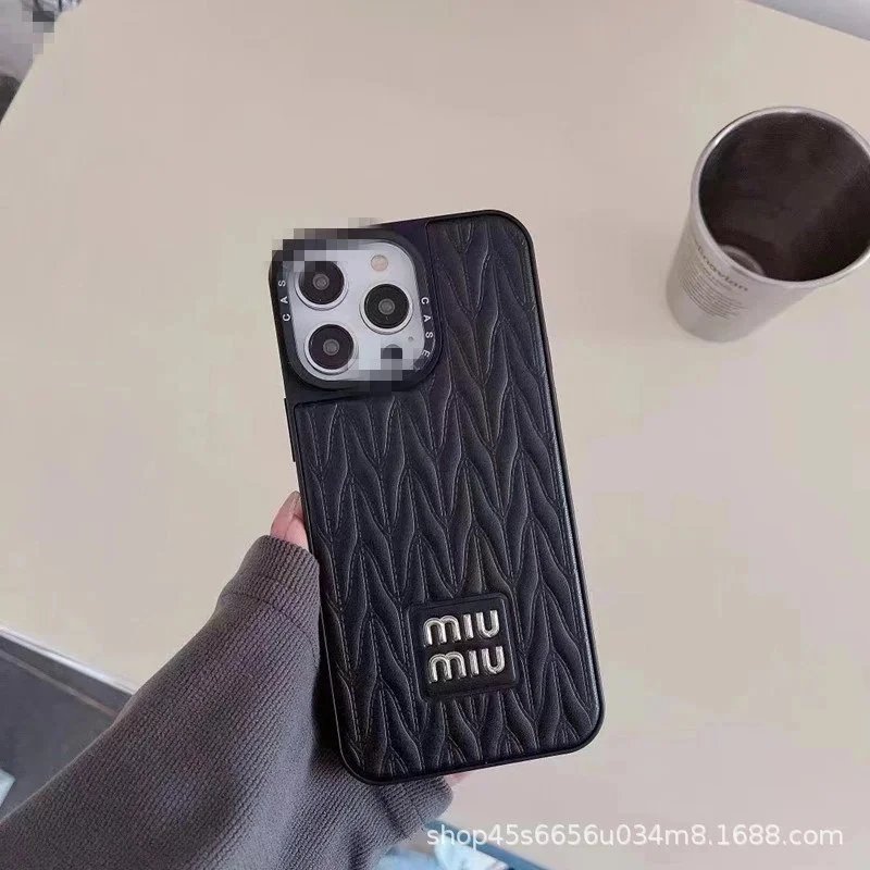 (an) Miu all inclusive black