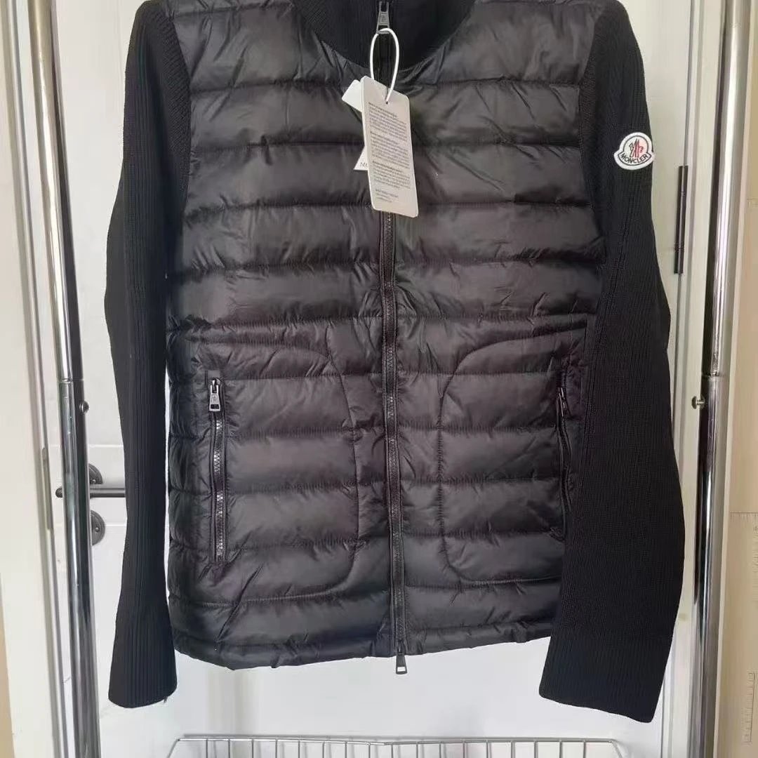 Stand up collar, black sleeves, white label