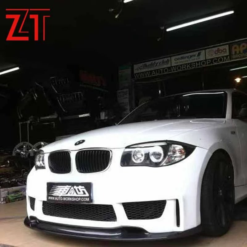 BMW 1 Series (E87) Carbon Fiber Exterior Modification Kit — Complete Set: Carbon Fiber Hood, Front Lip, Headlight Eyebrows, Rear Spoiler, and Side Mirror Covers.