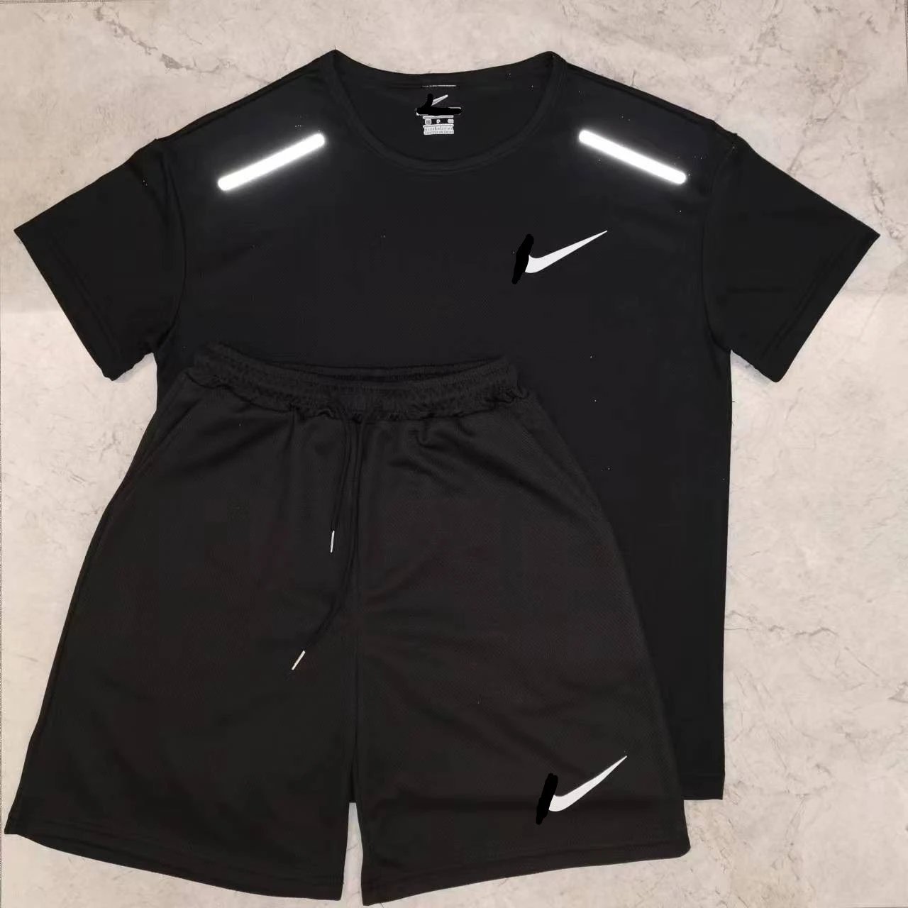 Nike short-sleeved shirt and shorts sportswear set