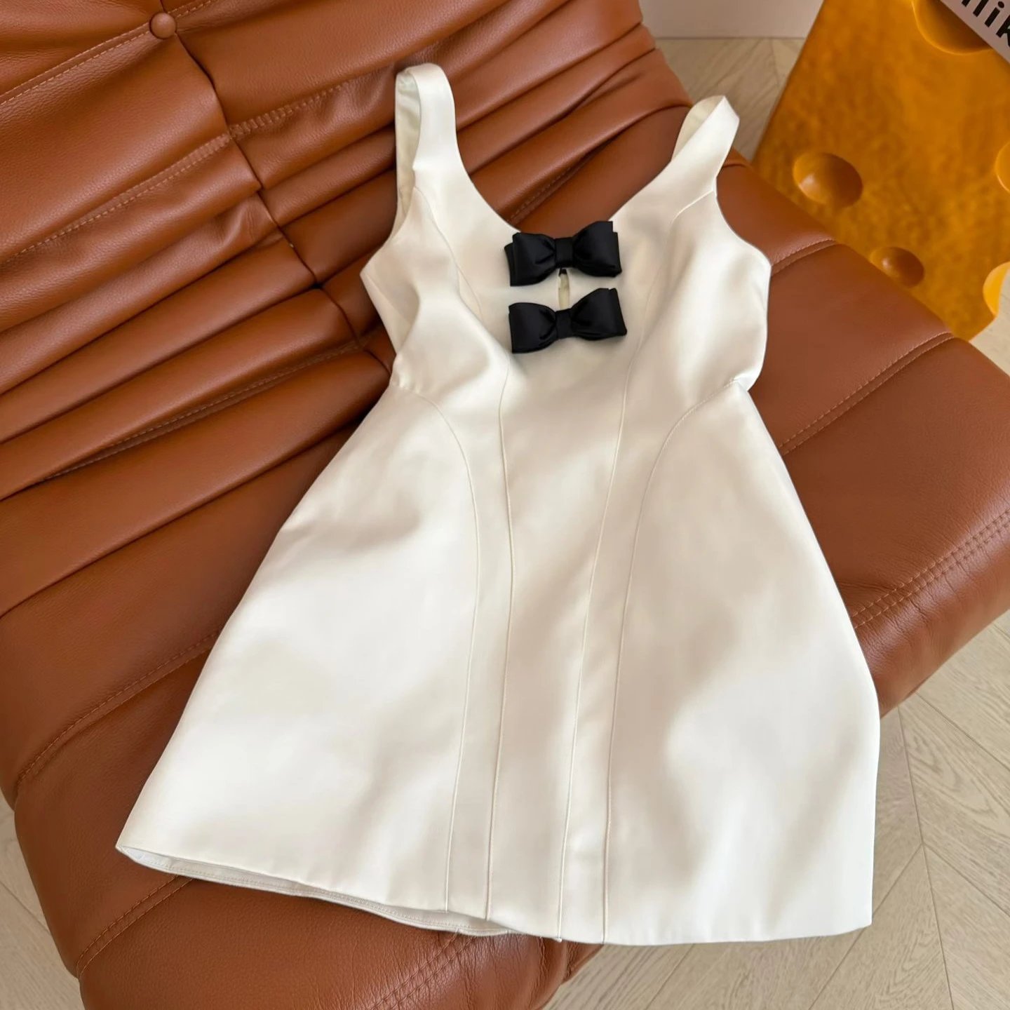 Women's White Satin Sleeveless A-Line Mini Dress with Double Black Bow