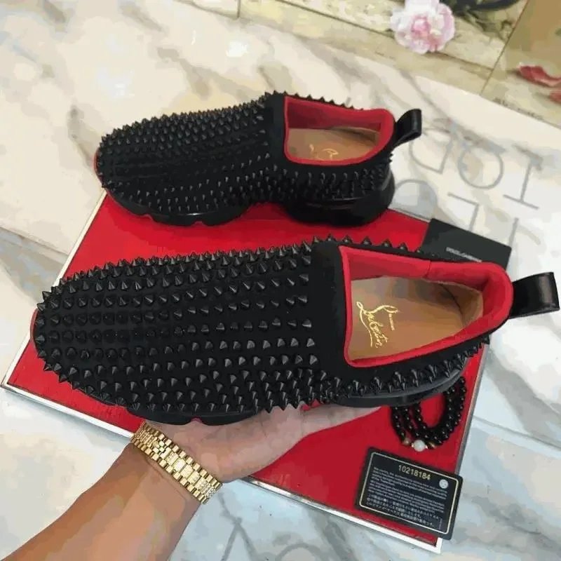 Christian Louboutin Spiked slip-on sneakers with red lining