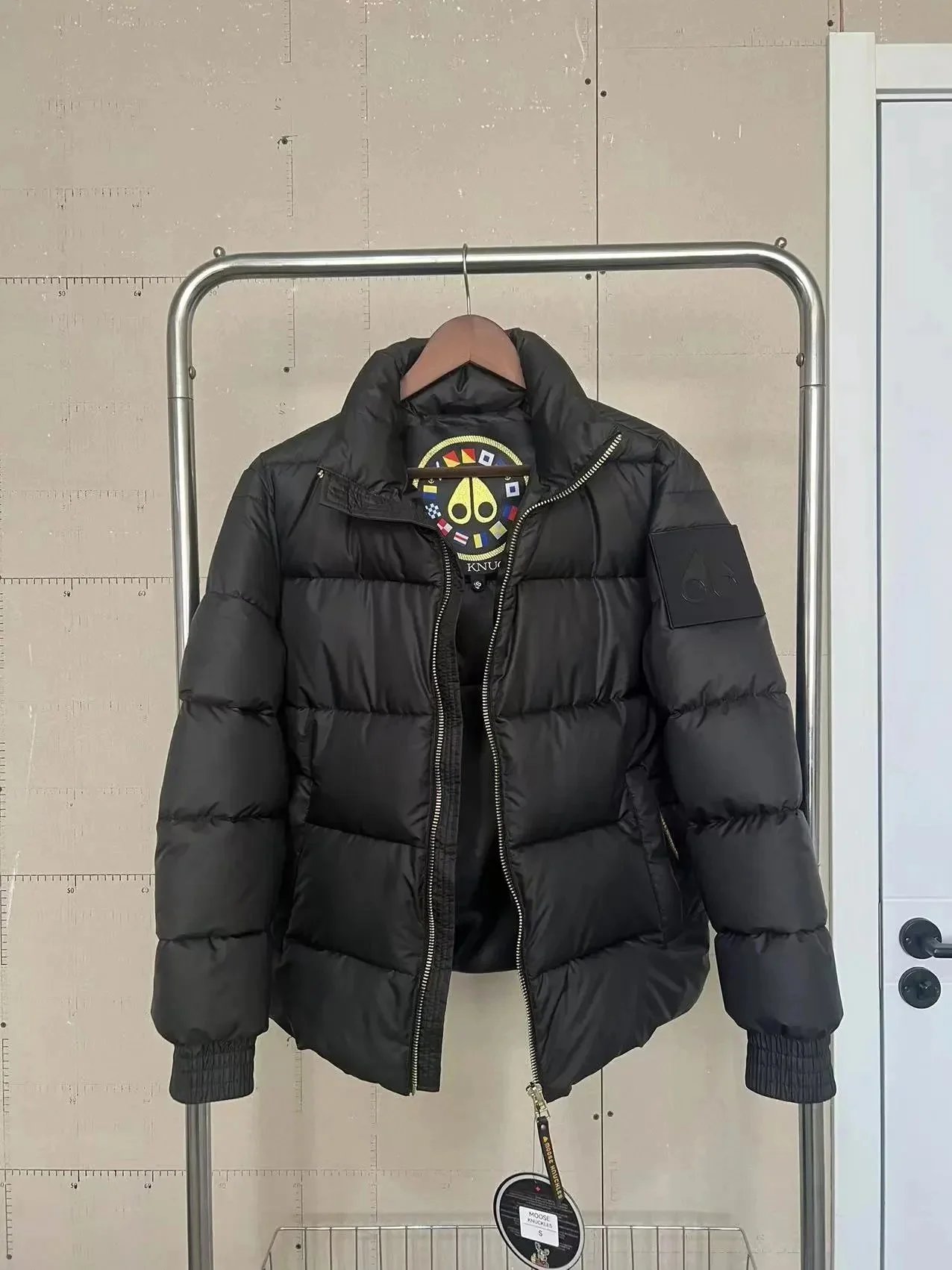 Moose Knuckles Down Jackets Quilted puffer jacket with high collar and sleeve logo patch product image