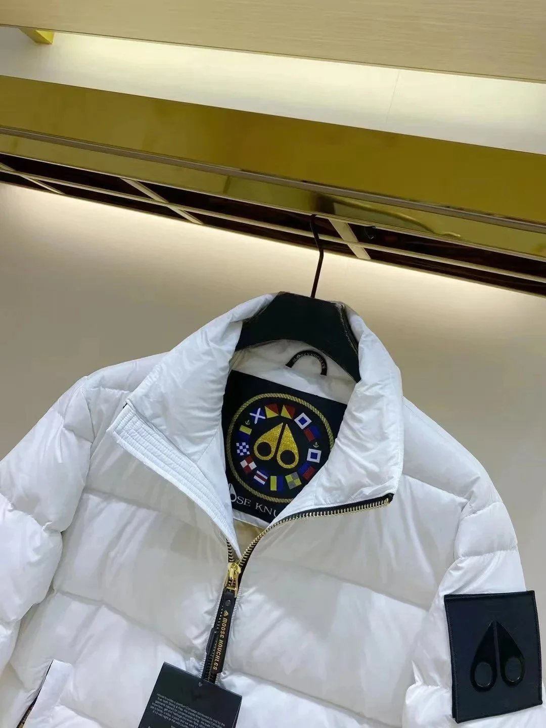 Moose Knuckles Down Jackets Quilted puffer jacket with high collar and sleeve logo patch image 7