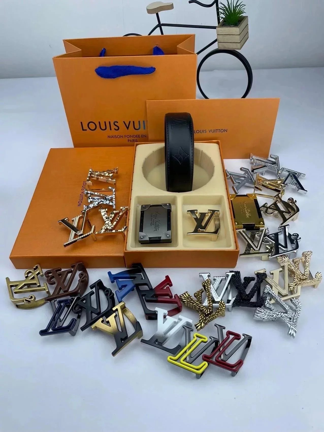 Louis Vuitton Black Leather Belt with Multiple Buckle Options