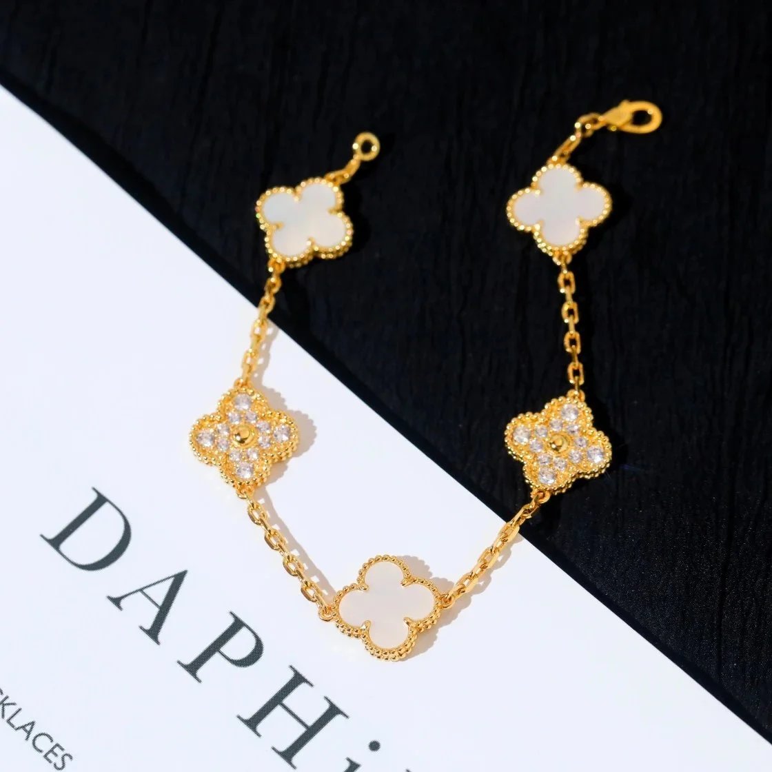 Design Four-Leaf Clover Charm Bracelet Gold-Tone with Mother-of-Pearl and Cubic Zirconia Jewelry - 4