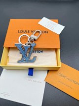 Louis Vuitton Monogram World Tour LV Logo Keychain