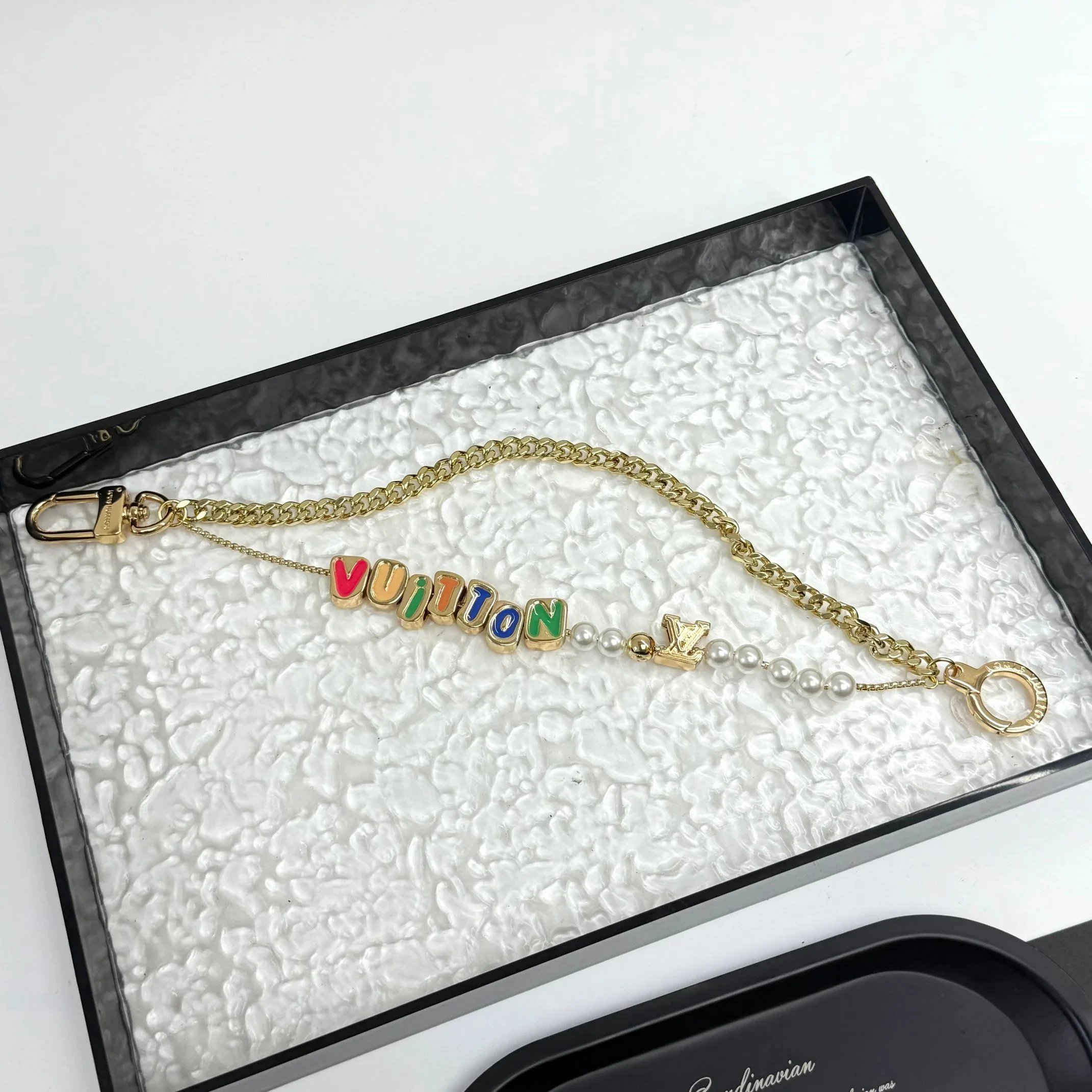 Louis Vuitton Vuitton Chain Belt and Bag Charm Collection - 007584
