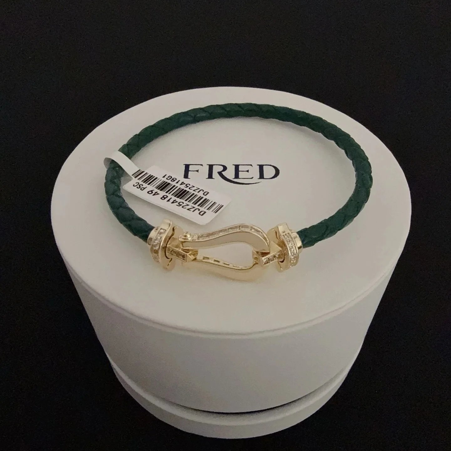 Fred green braided cord bracelet with gold-tone horseshoe clasp