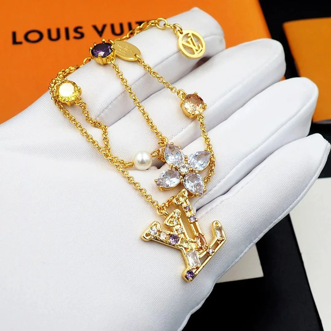 Louis Vuitton Monogram World Tour Gold-Tone Bracelet with Gemstones and Pearl Jewelry - 8