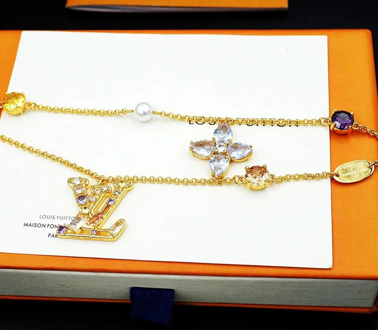 Louis Vuitton Monogram World Tour Gold-Tone Bracelet with Gemstones and Pearl Jewelry - 7