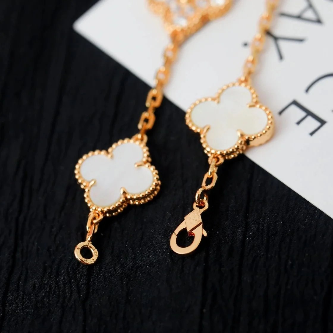 Design Four-Leaf Clover Charm Bracelet Gold-Tone with Mother-of-Pearl and Cubic Zirconia Jewelry - 9