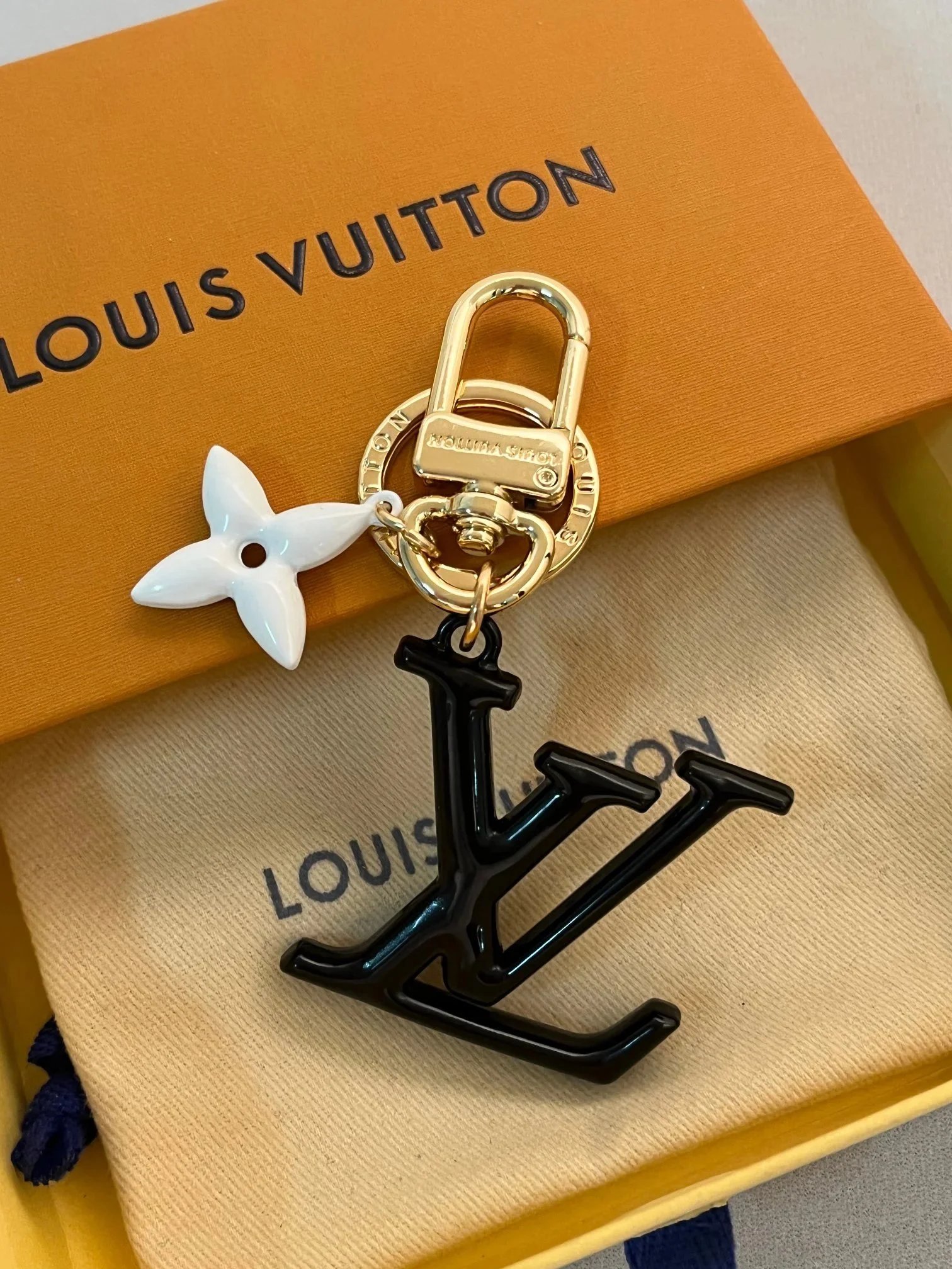 Louis Vuitton LV Circle Key Holder with White Flower Charm