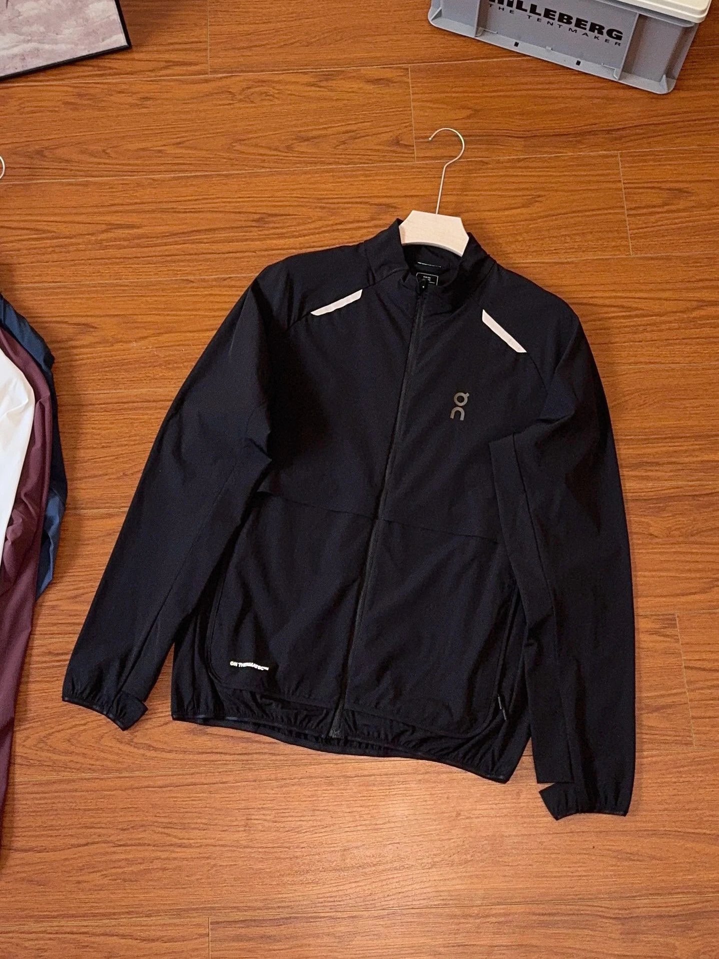 On Jackets Lightweight zip-front running jacket with reflective shoulder trim — Black