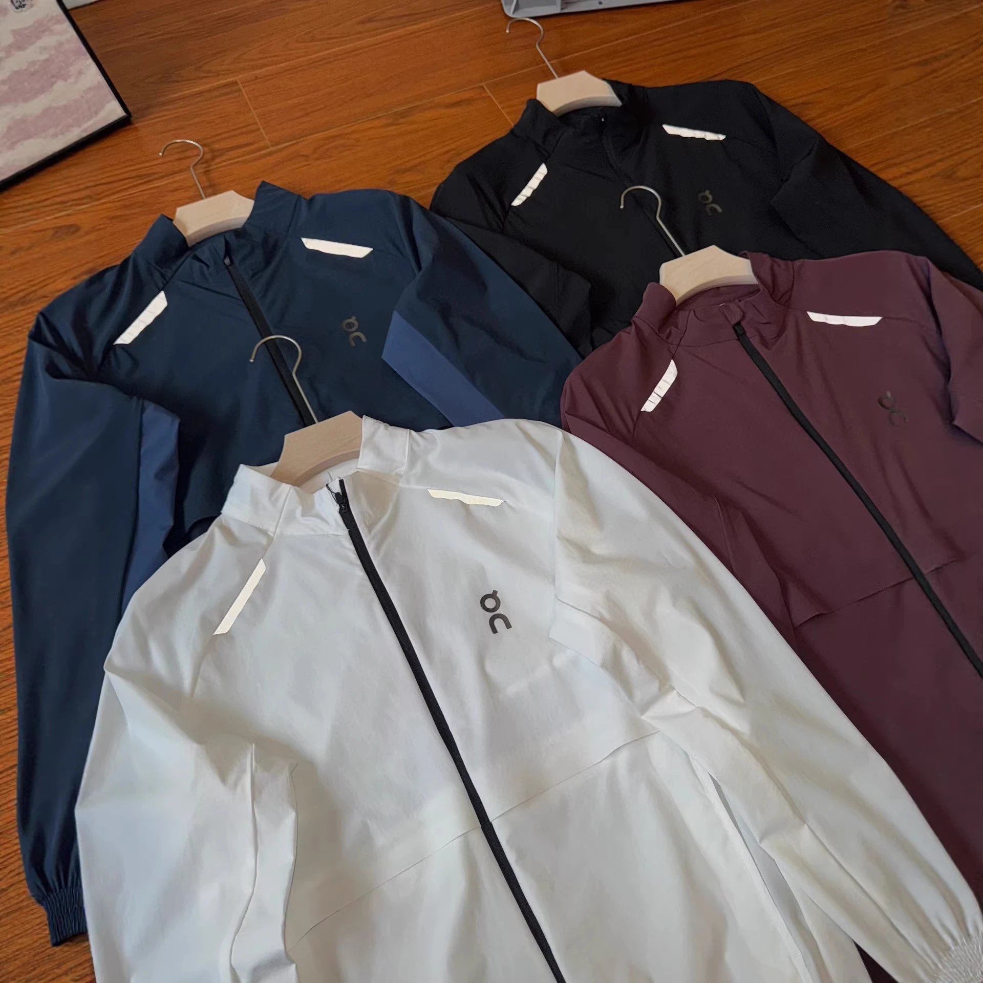 On Jackets Lightweight zip-front running jacket with reflective shoulder trim image 5