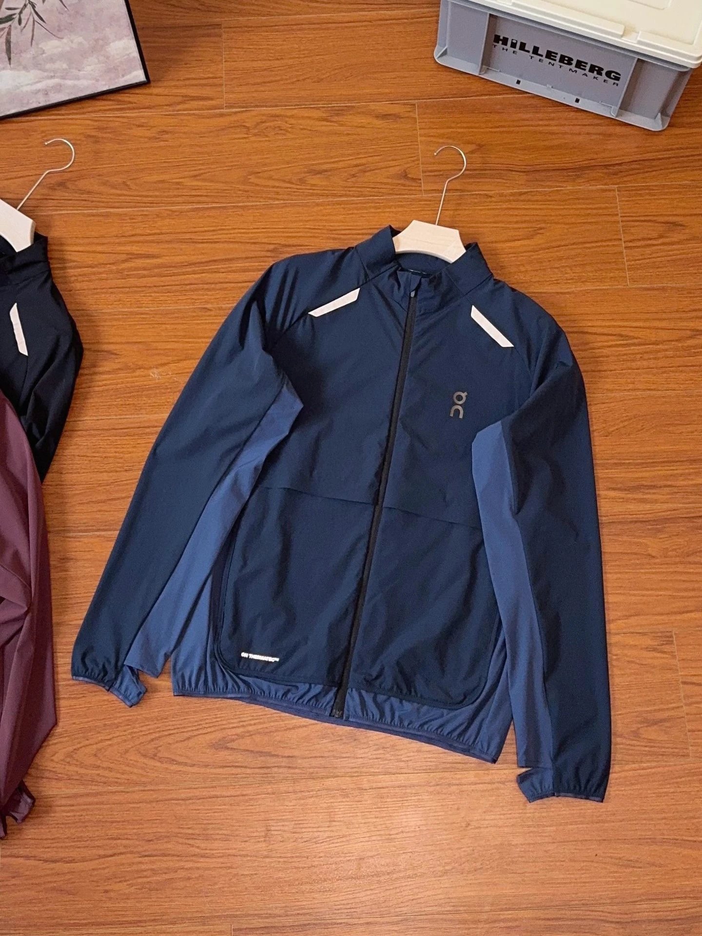 On Jackets Lightweight zip-front running jacket with reflective shoulder trim — Blue