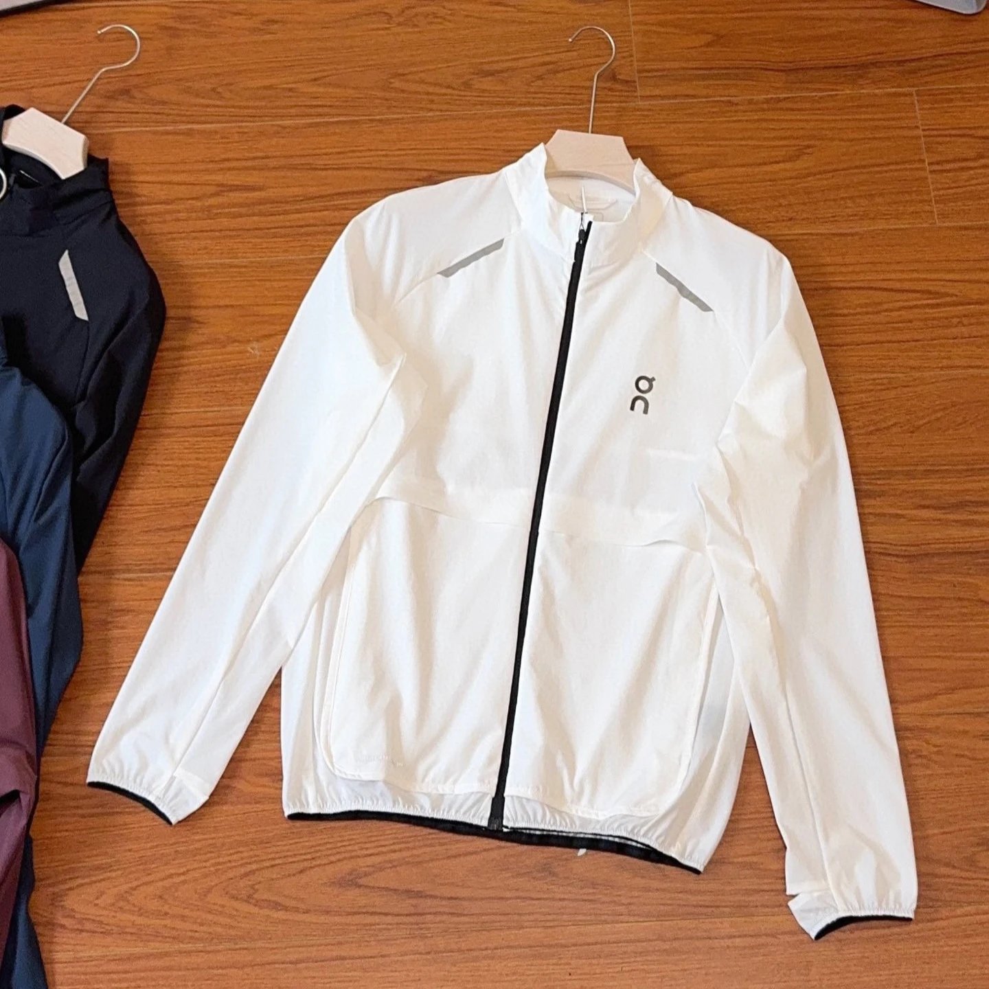 On Jackets Lightweight zip-front running jacket with reflective shoulder trim image 3