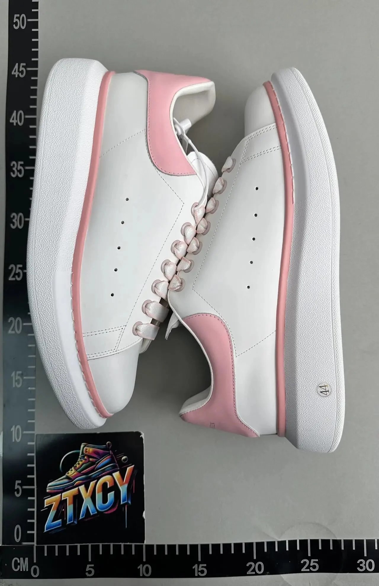 Unbranded Sneakers Low-top lace-up with oversized soles and perforated side panels — 23